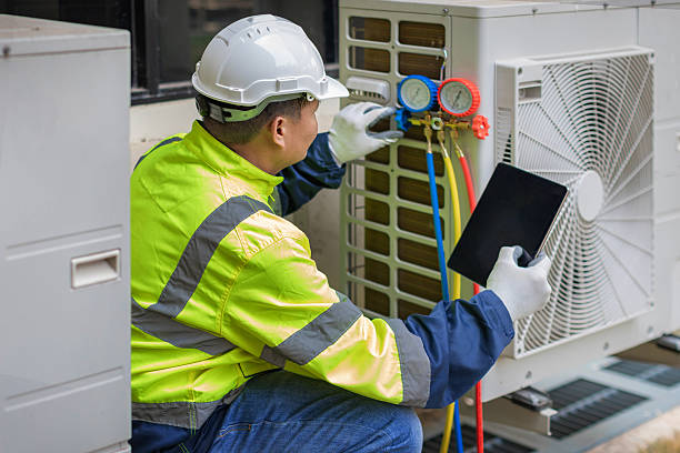 Professional Heat Pump Repair technician working in Tecumseh, NE